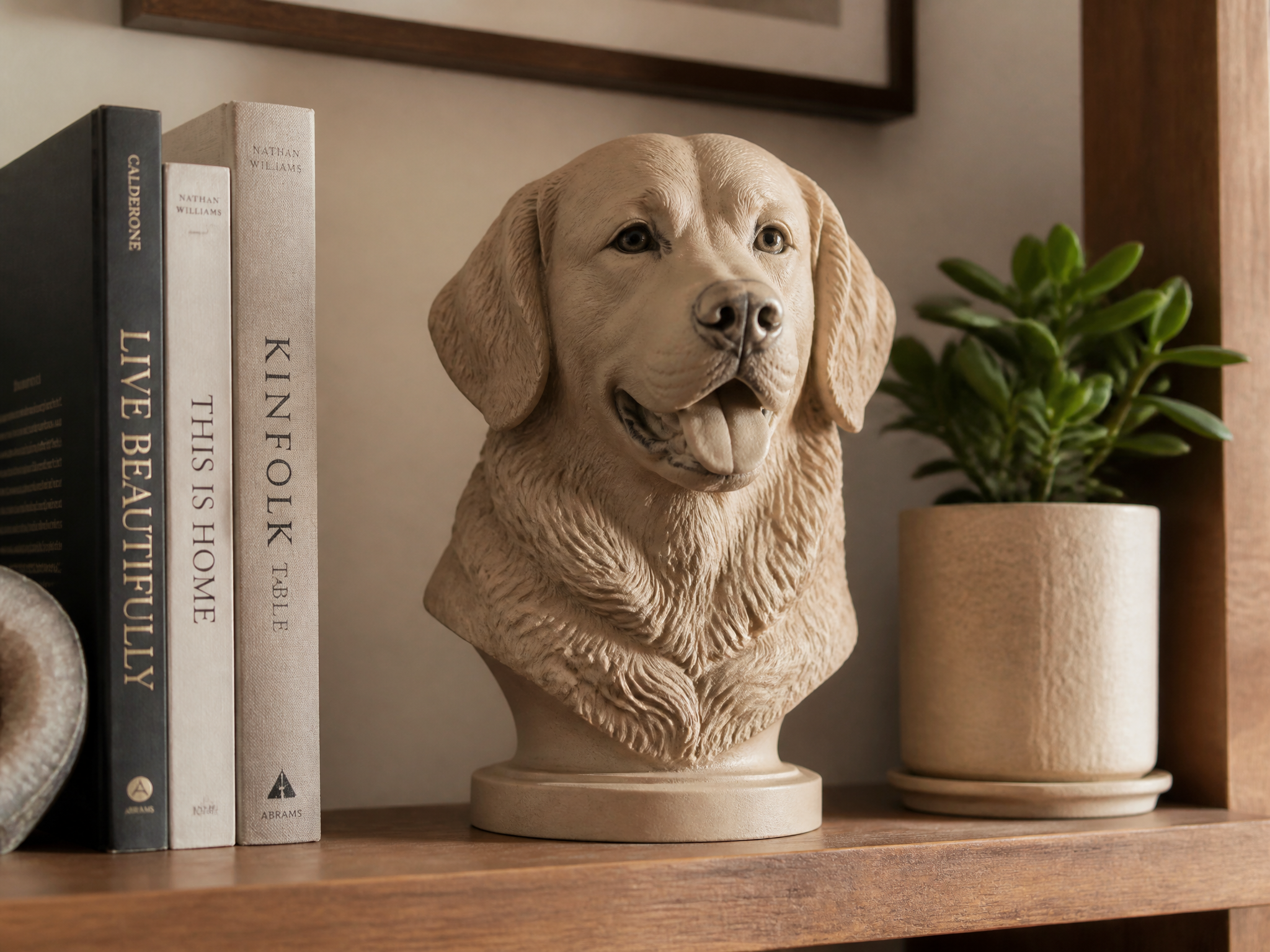 A hand-finished 3D pet portrait bust on a styled shelf